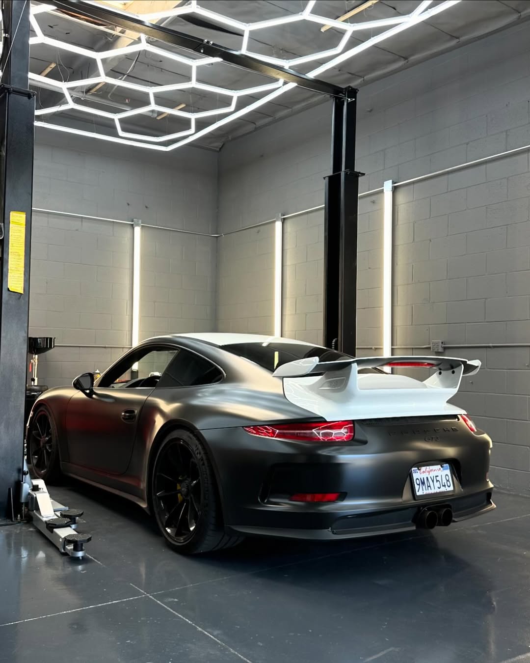 Bambi's Automotive - Professional Service Bay with Porsche